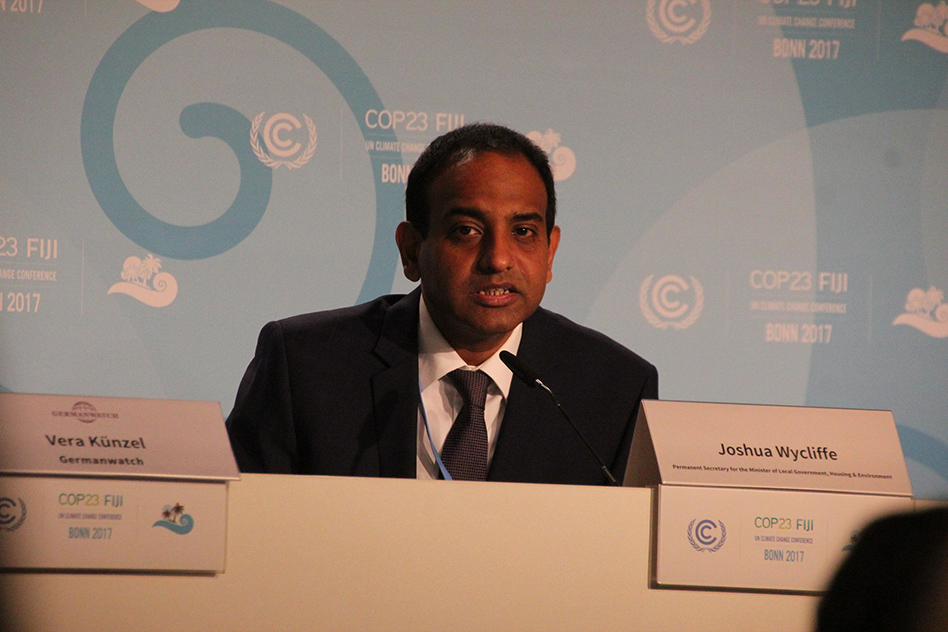 Photo: Joshua Wycliffe from Fiji onGermanwatch panel on climate risk - IMG_1988 (Source: Takver) Jacoby_USNWR.jpg