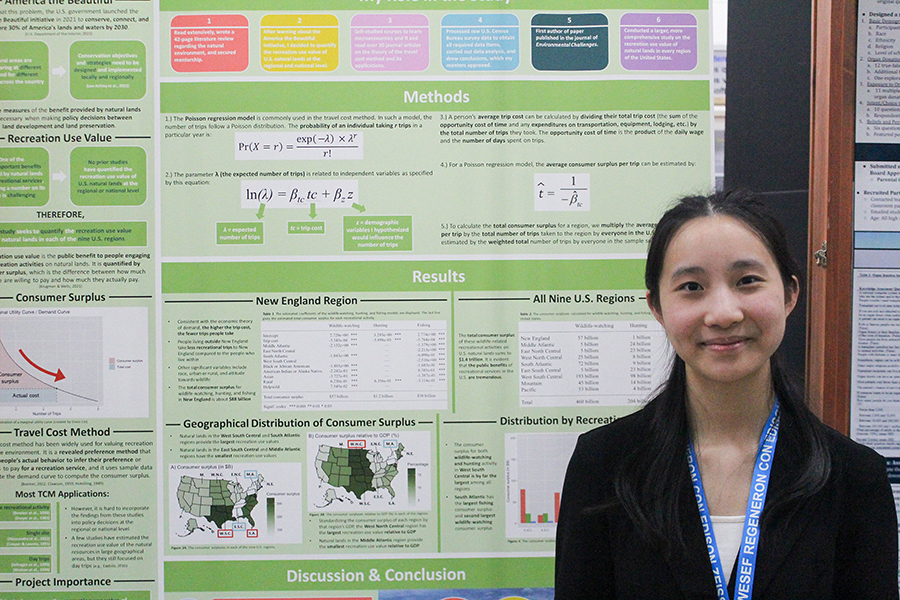 High school student Grace Lin with her award-winning research poster