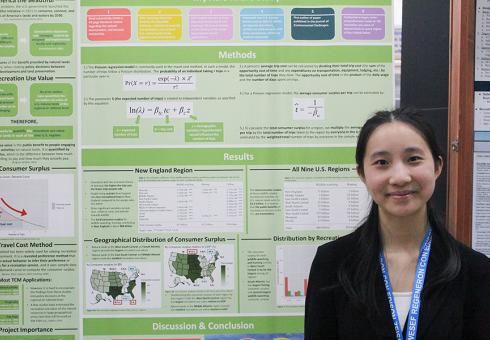 High school student Grace Lin with her award-winning research poster